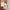 Woman holding Rose Gold holdall and wash bag – 40x20x25cm and 30x12x16cm dimensions chart
