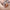Open Vacay Terra Cotta suitcase interior packed with clothes and travel accessories