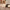 Close-up of smooth 360-degree spinner wheel on Vacay Stone hard shell suitcase