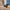 Close-up of smooth 360-degree spinner wheel on Vacay Slate Blue underseat cabin bag